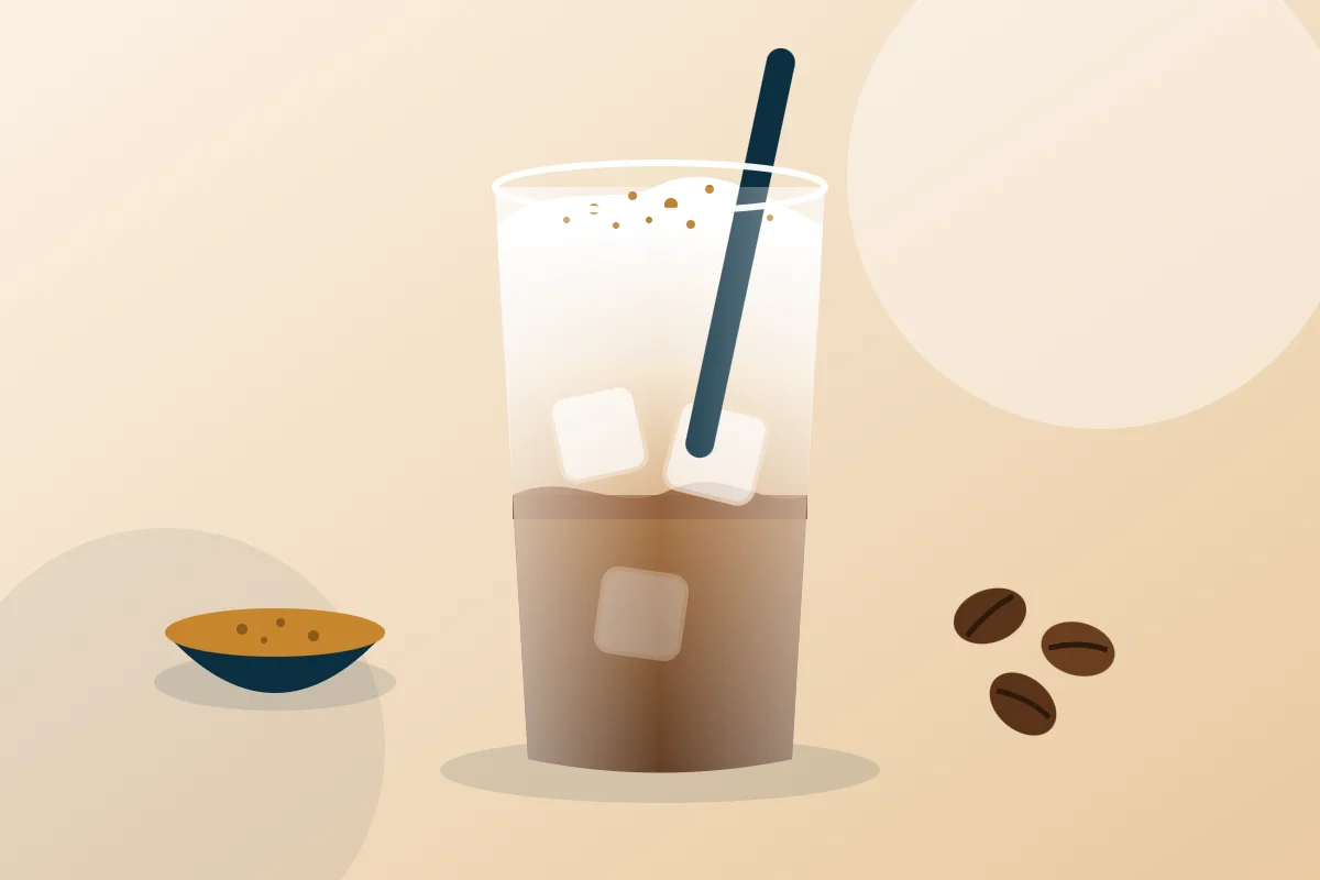 Iced cappuccino with milk foam and gold coffee on top